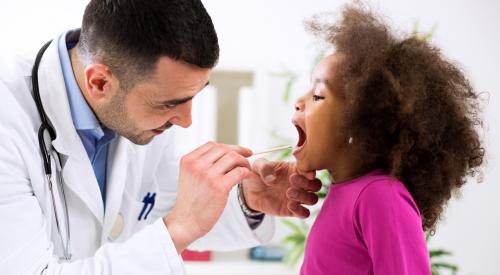 Pediatrician with Patient
